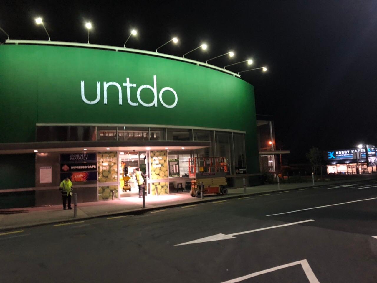 Supermarket exterior at night during a commercial fit-out